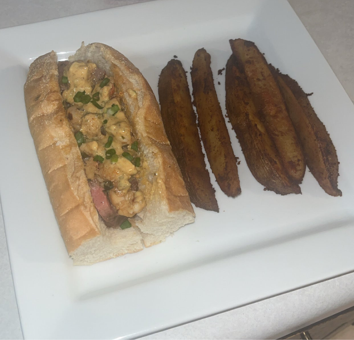 Steak & Lobster roll w/ tater wedges
