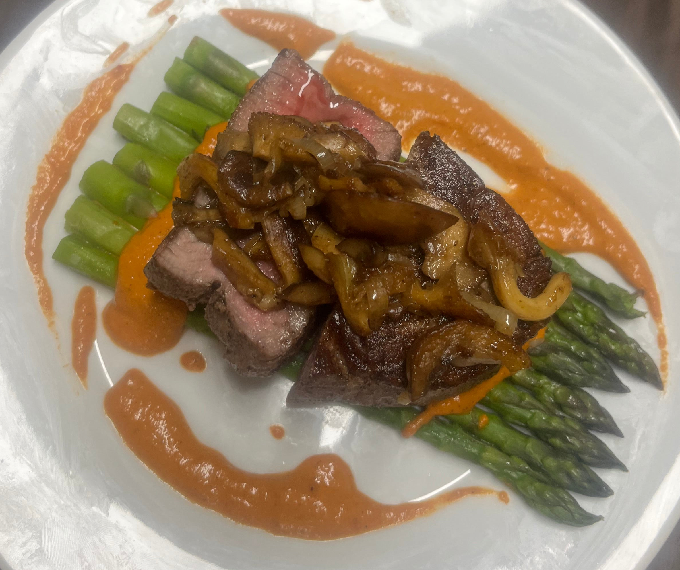 Filet Mignot w/ asparagus, sautéed mushrooms and shallots and romesco