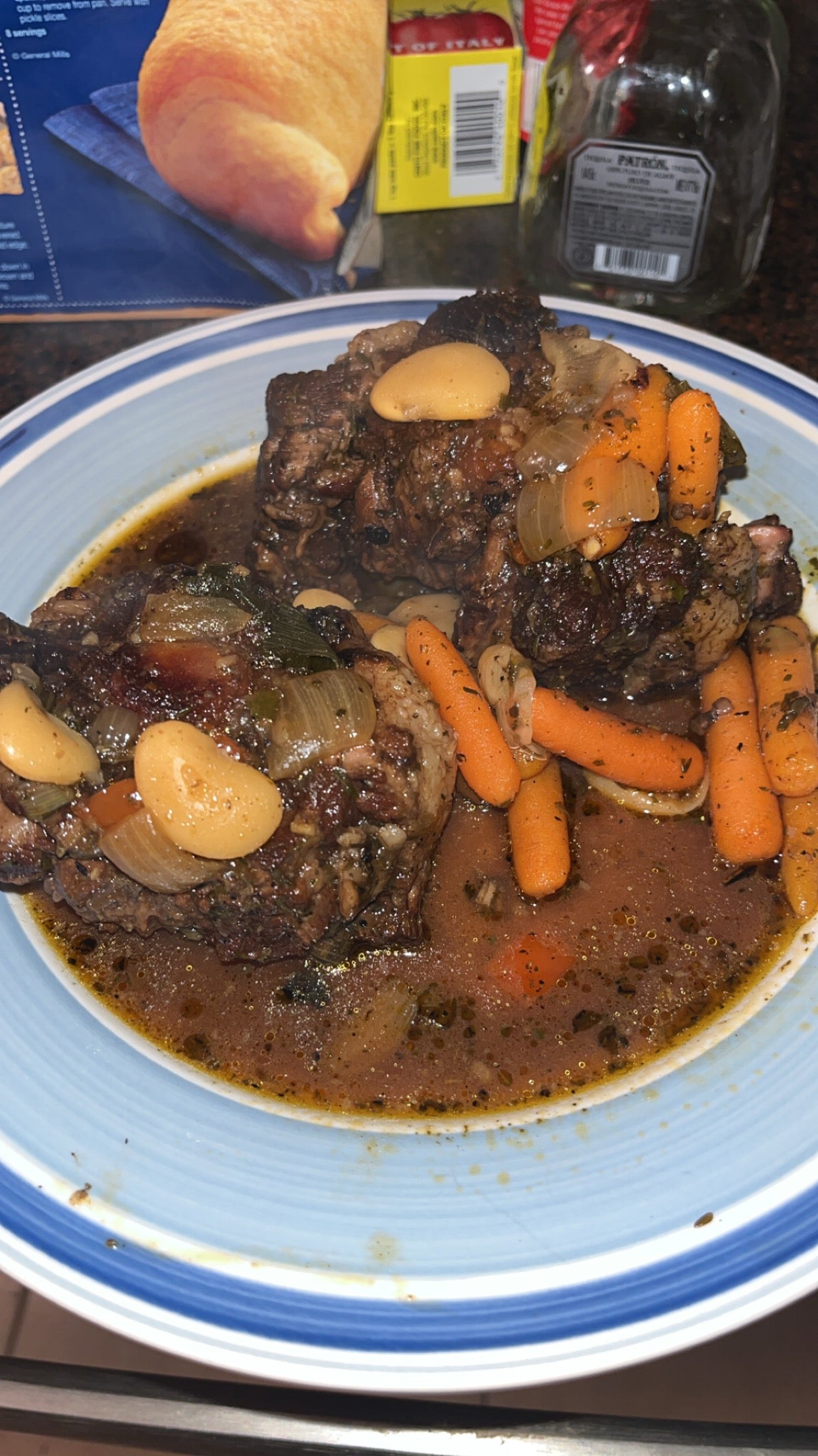 Jamaican Style ox-tail w/ butter beans and carrots