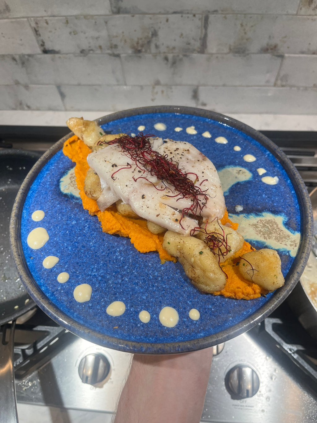 Sable Fish, w/ brown butter gnocchi and a carrot ginger puree