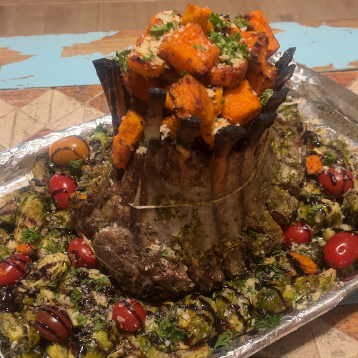 Crown Lamb Roast w/ crispy roasted sweet potatoes and roasted lemon-garlic Brussels sprouts